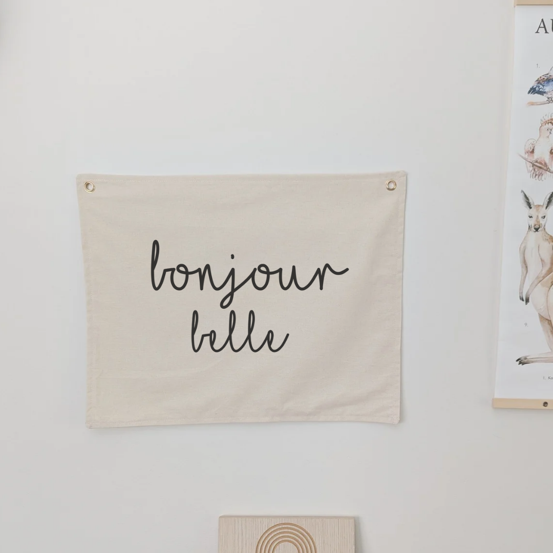 Bonjour Belle print design. Wall banner for nursery, bedroom or playroom. For kids . Oat colour banner with cotton fabric and gold grommets