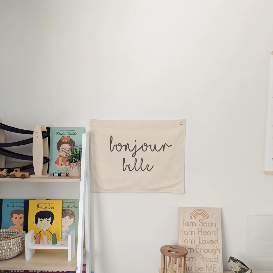Bonjour Belle print design. Wall banner for nursery, bedroom or playroom. For kids . Oat colour banner with cotton fabric and gold grommets