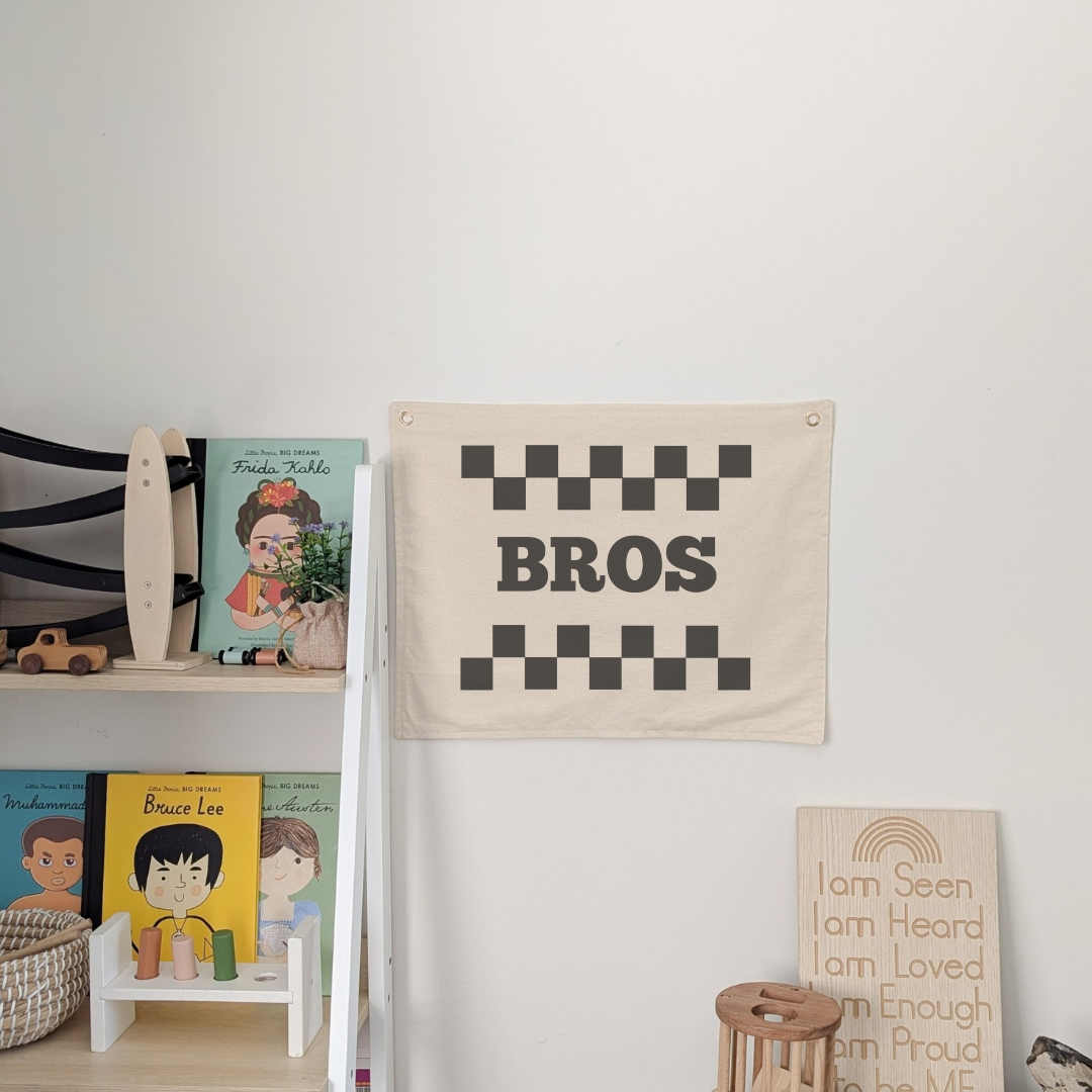 Bros with checkered print design. Wall banner for nursery, bedroom or playroom. For kids . Oat colour banner with cotton fabric and gold grommets