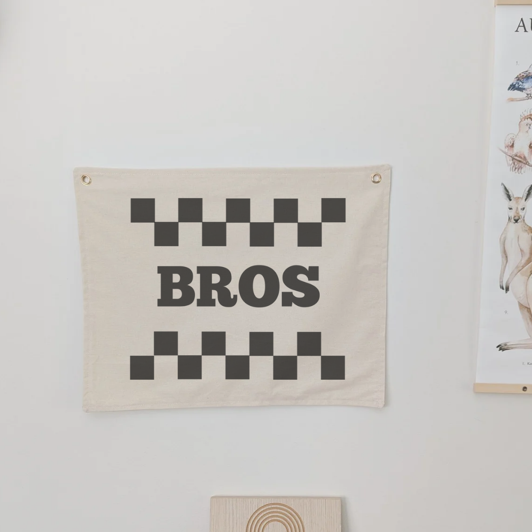 Bros with checkered print design. Wall banner for nursery, bedroom or playroom. For kids . Oat colour banner with cotton fabric and gold grommets