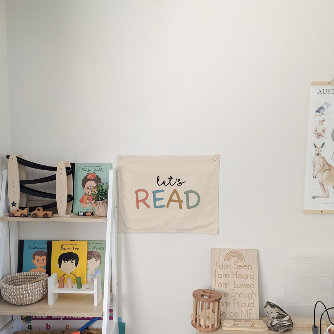 lets read wall banner for kids playroom or nursery in a neutral colour and pastels. kids who like to read decor .