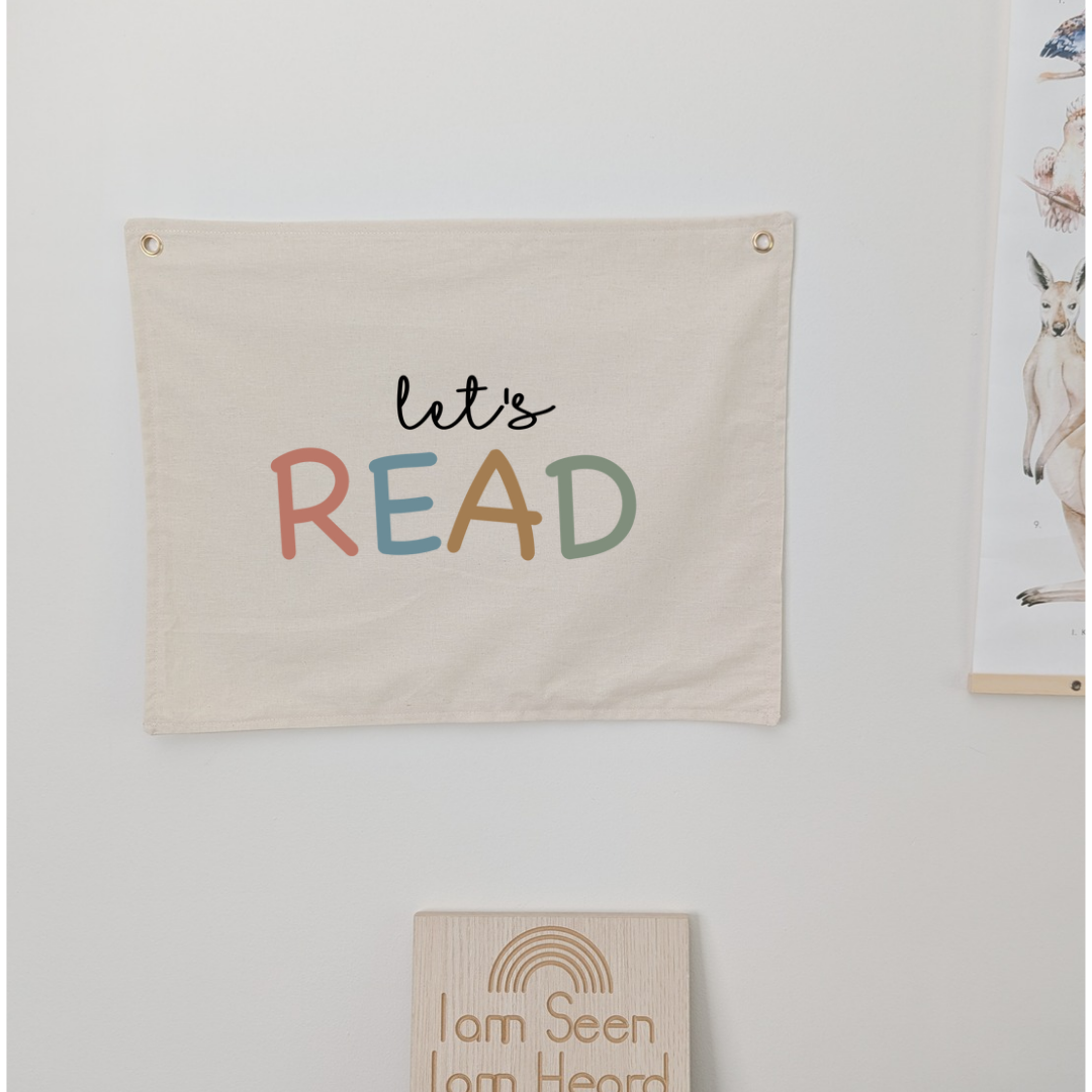 lets read wall banner for kids playroom or nursery in a neutral colour and pastels. kids who like to read decor .