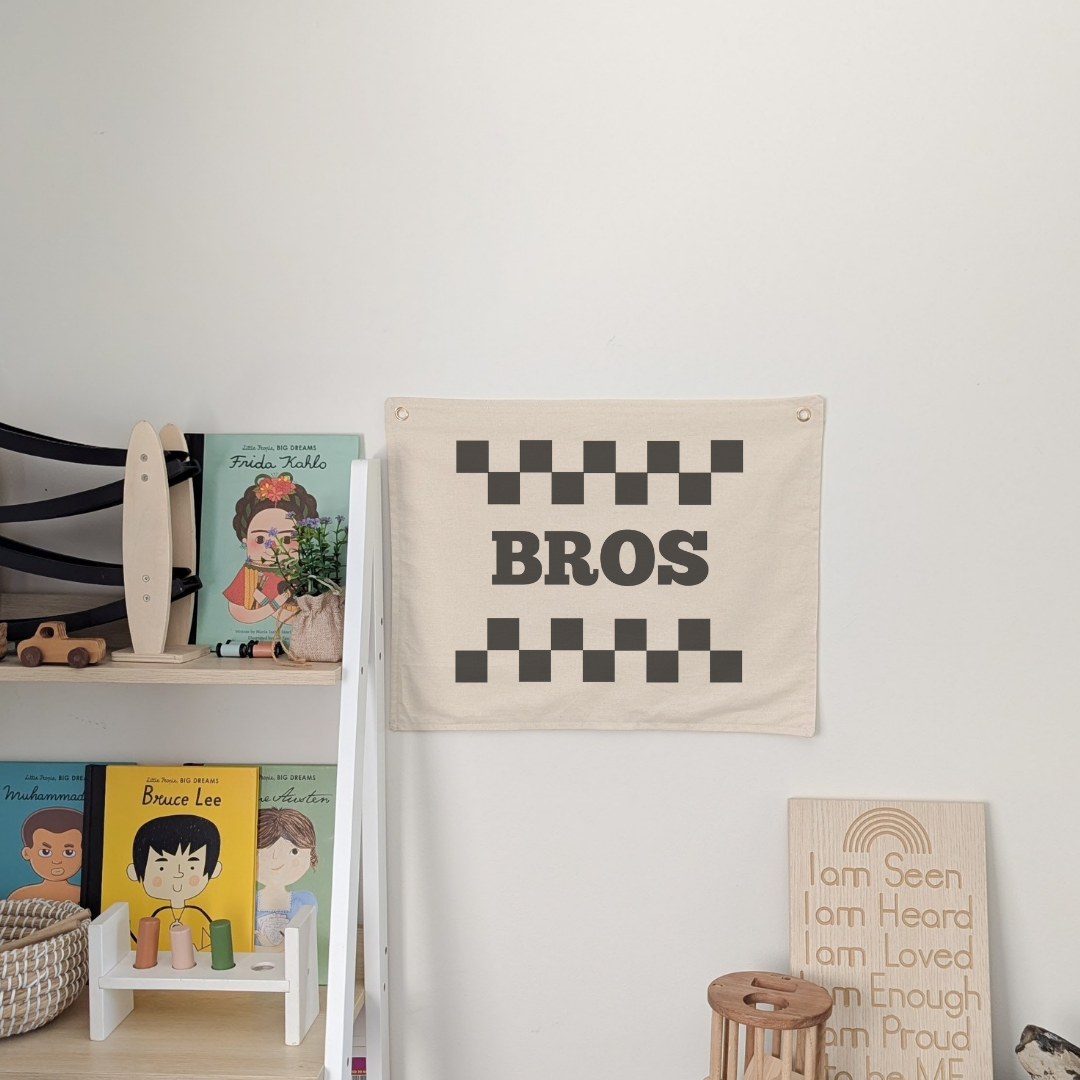 Bros with checkered print design. Wall banner for nursery, bedroom or playroom. For kids . Oat colour banner with cotton fabric and gold grommets 