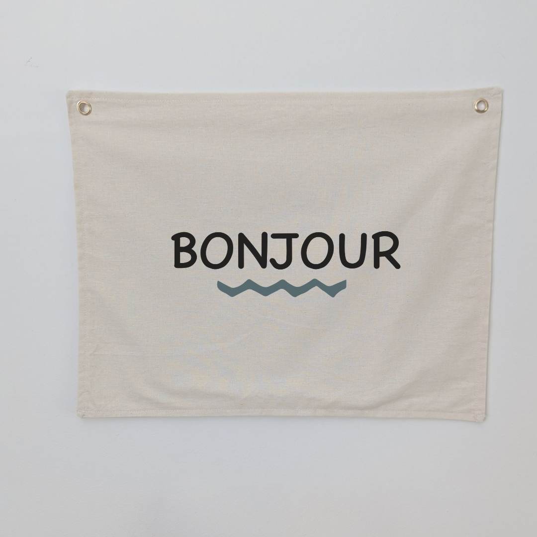 Bonjour wall banner . Oat colour cotton fabric . Wording says Bonjour. Bedroom decor . Wall art 